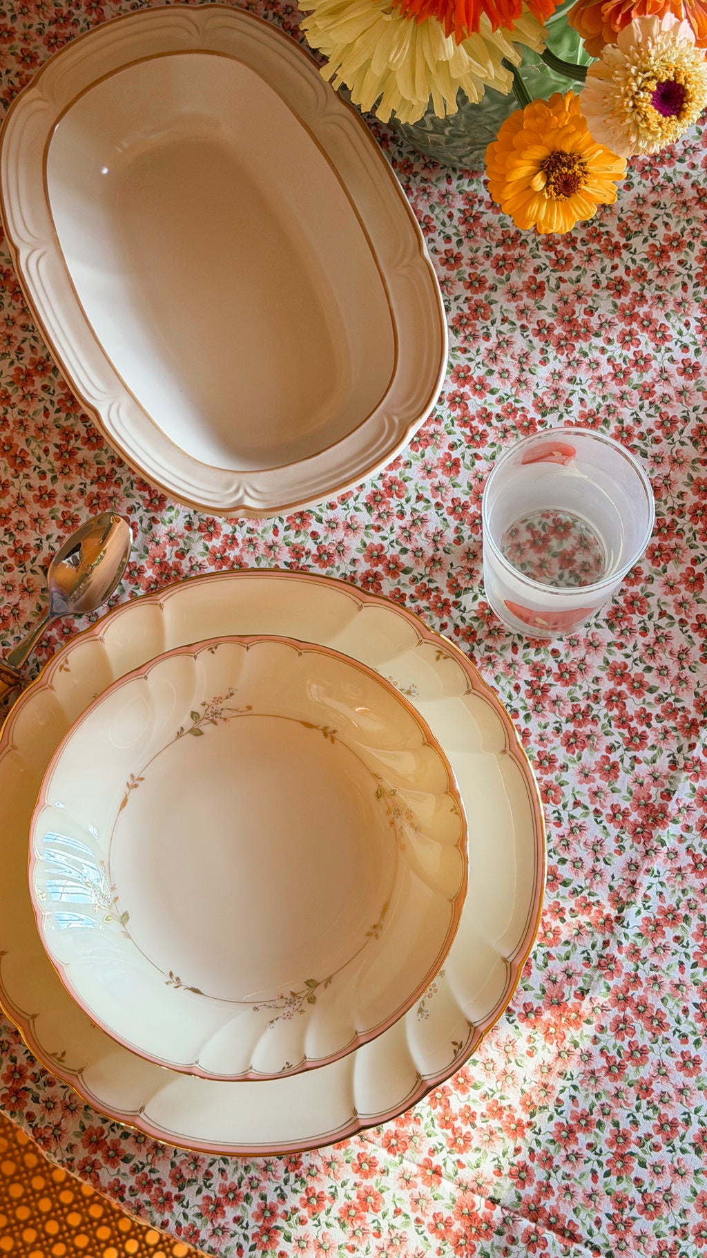 overhead shot of a cozy cottage table with Mikasa china and a Vintage Covington Edition Idlewild Oval Vegetable Bowl 