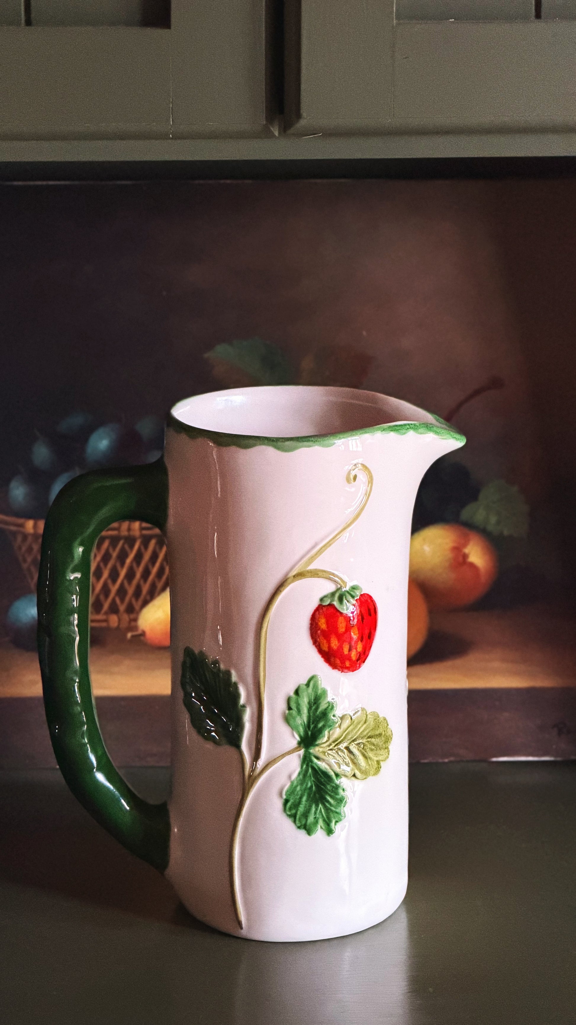 backside of a Vintage Mancer Italy Majolica Strawberry Ceramic Pitcher