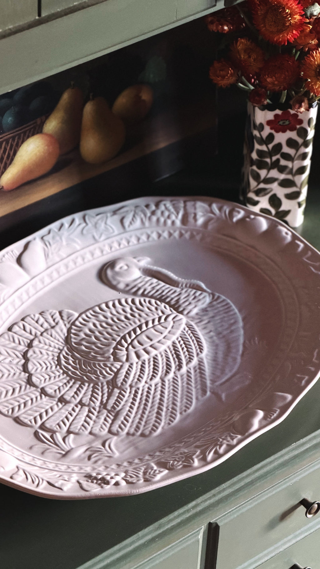 large Thanksgiving platter on a shelf 
