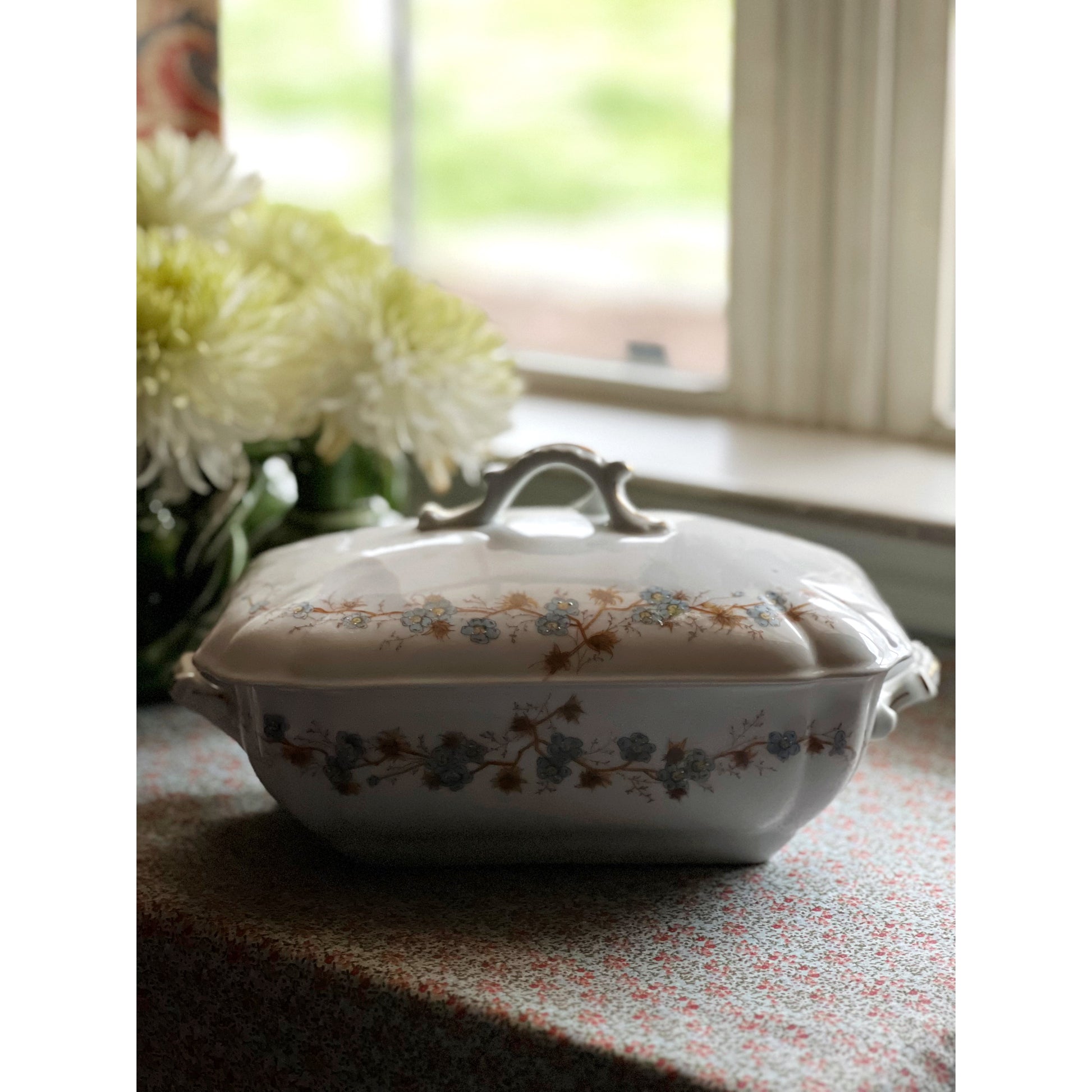 blue floral covered vegetable dish