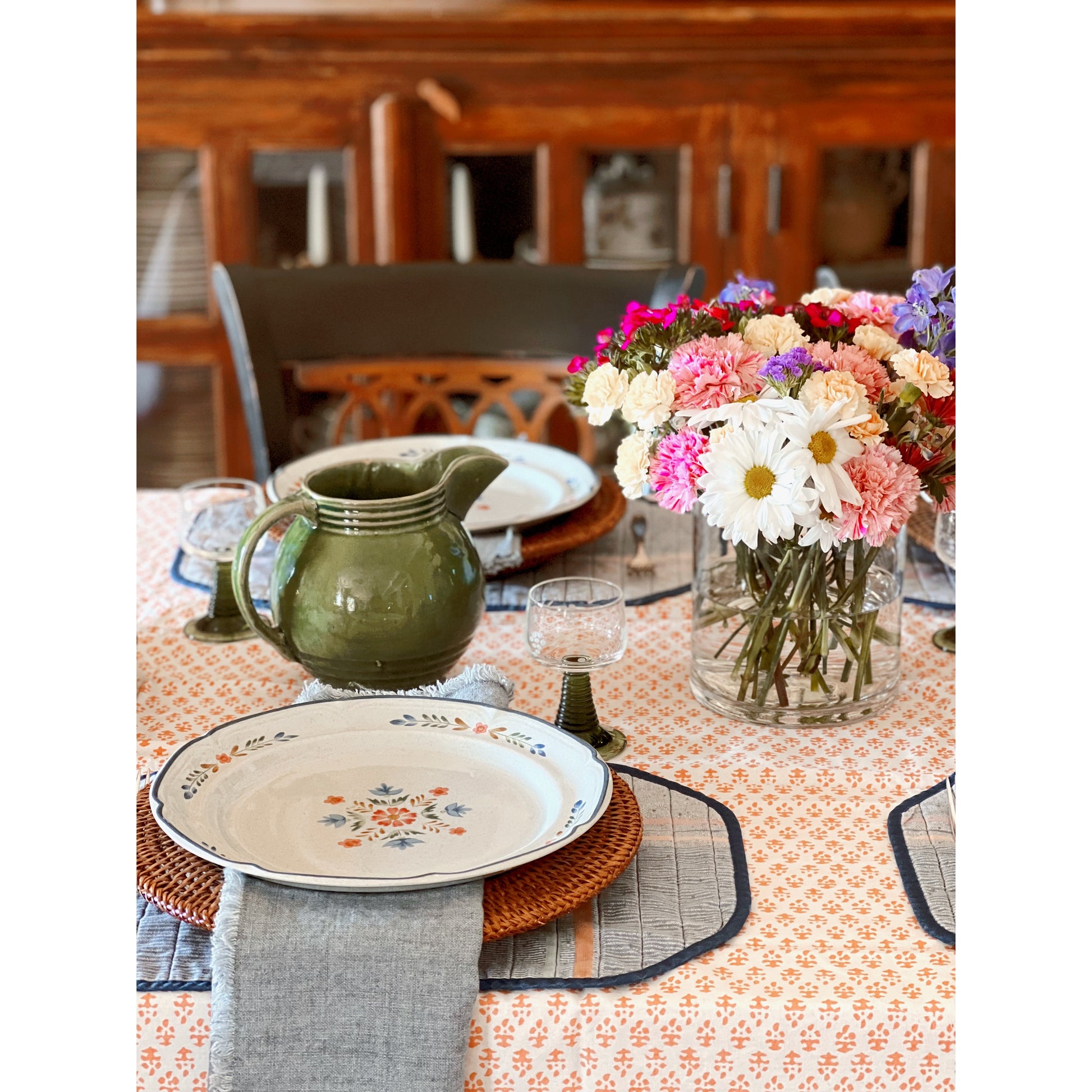 table set for a meal with International Tableworks American Patchwork Dinner Plates