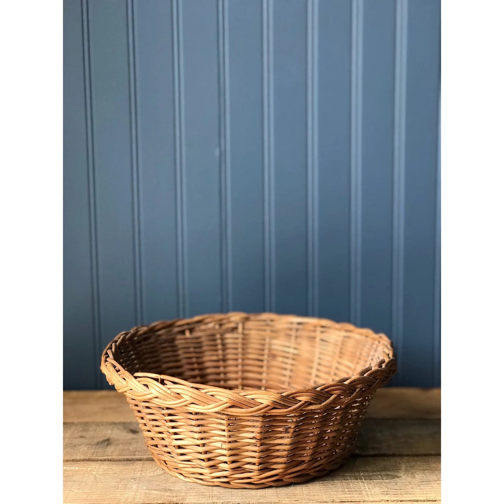 round basket on a wooden surface