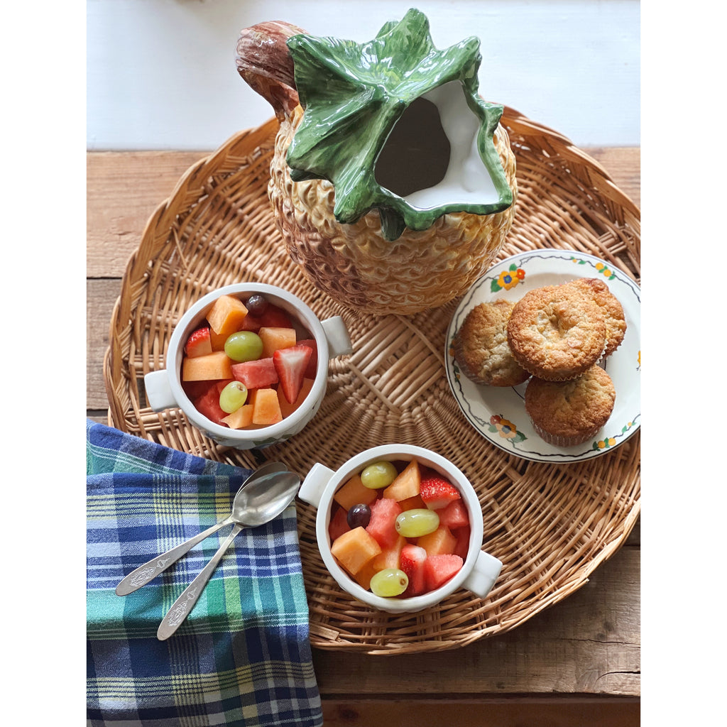 floral saucer used as a plate on a tray